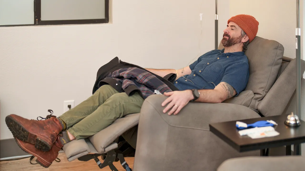 a man lying in a chair - rs=w_1280,h_720 (2)